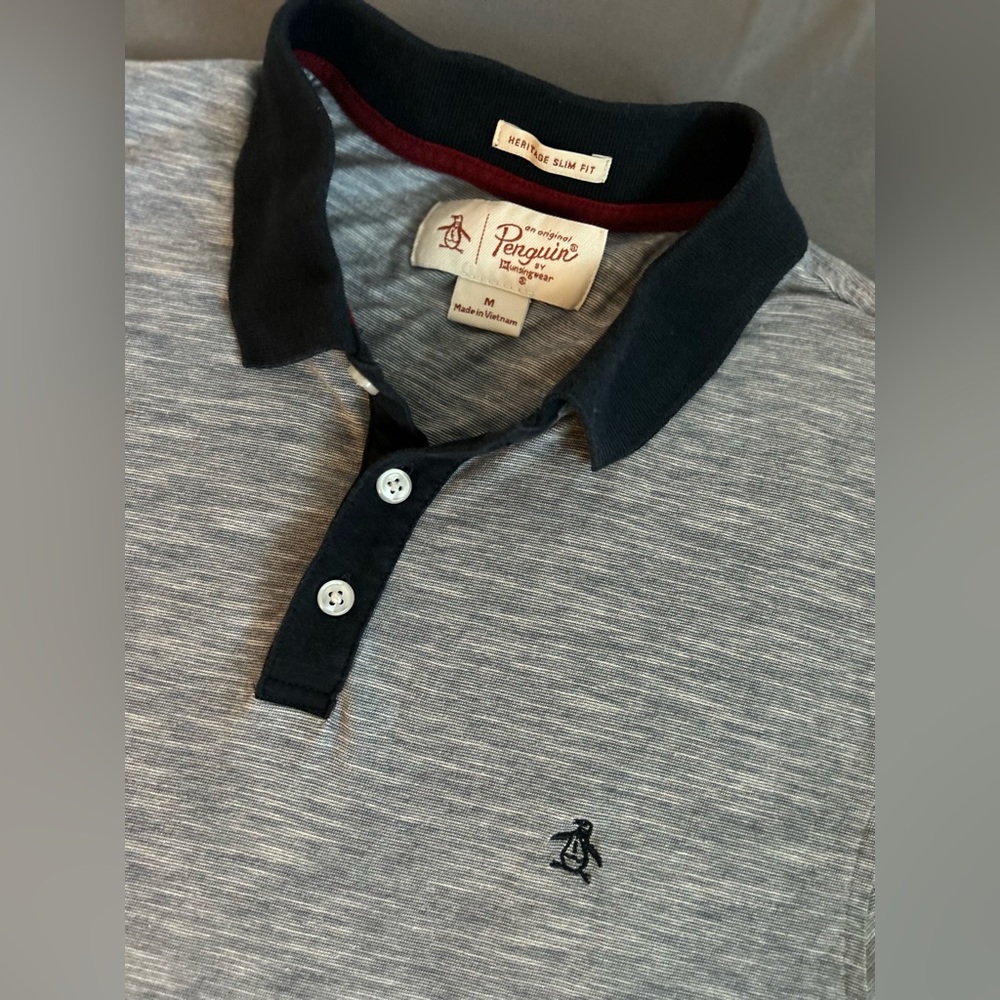 Penguin polo in navy.  Men’s medium
